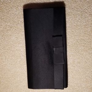 Vintage black evening clutch with bow.